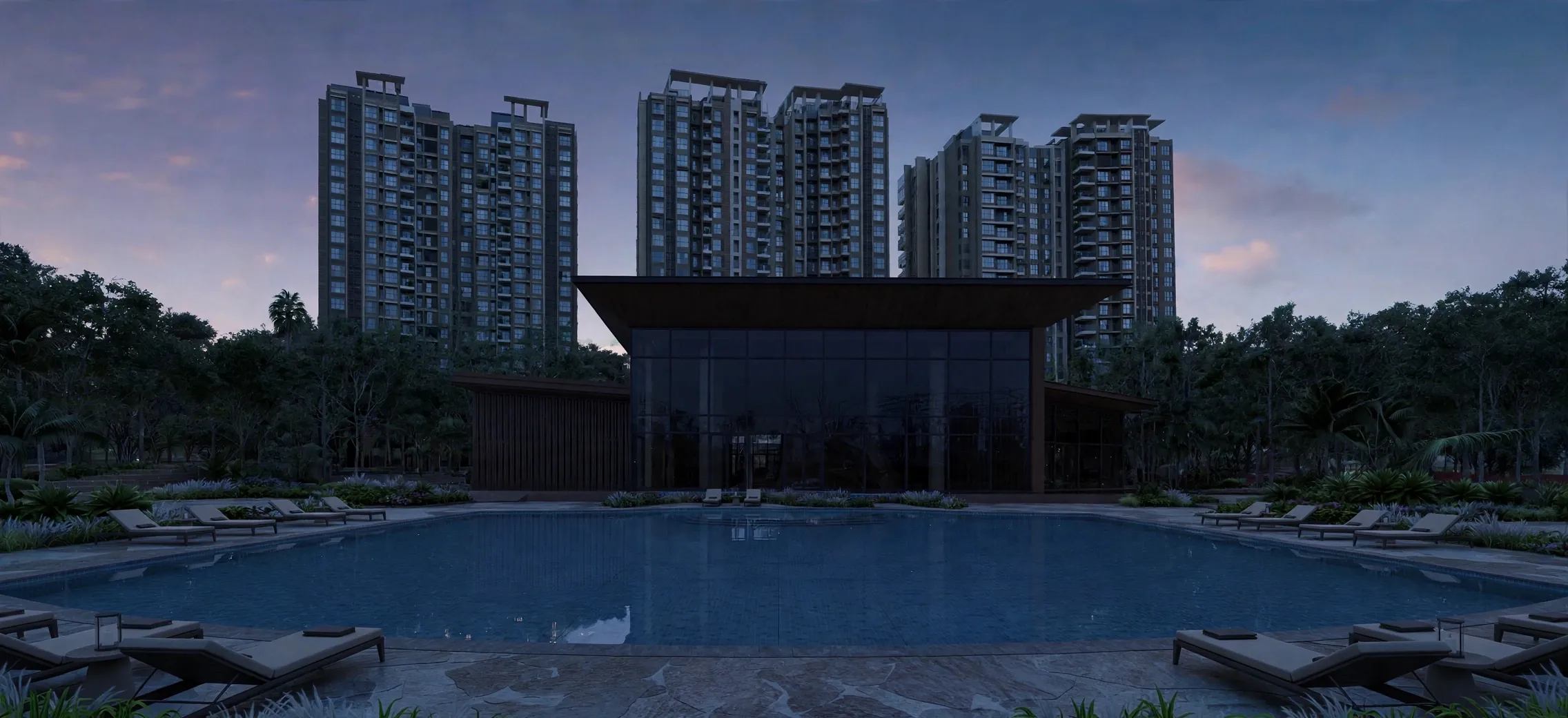 A new condominium estate at dusk, its towers, clubhouse and pool still dark